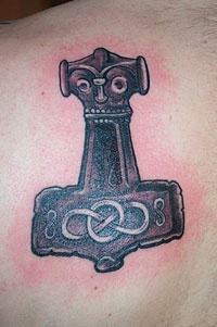 Qualitative Mjollnir black ink tattoo