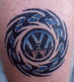 Volkswagen logo encircled tattoo - Tattooimages.biz