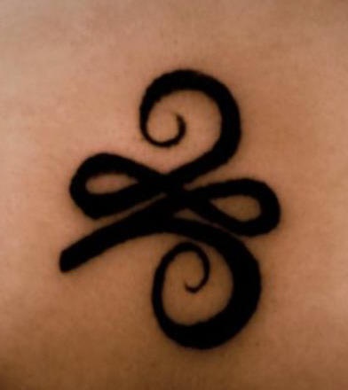 Einfaches schwarzes Symbol Tattoo