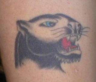 Tattoo of growling panther head