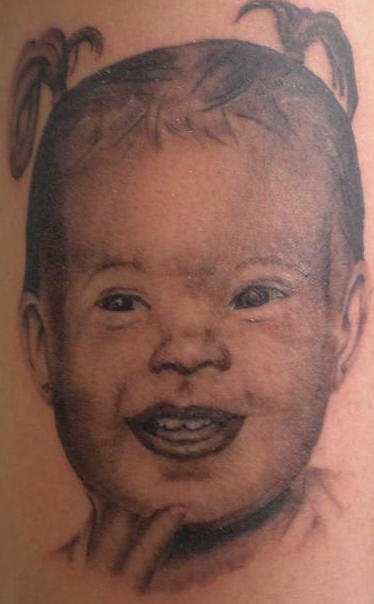  tattoo of kids portrait