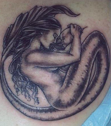 Black ink tattoo of mermaid holding baby