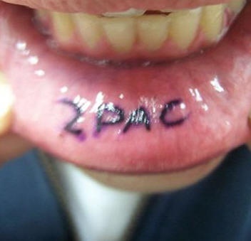 Tattoo on lip, 2pac, black, bold letters