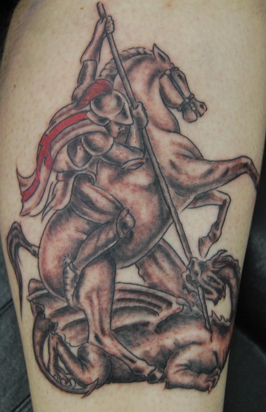 Leg tattoo, warrior with horse killing other soldier