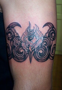 Devil with thorns tattoo