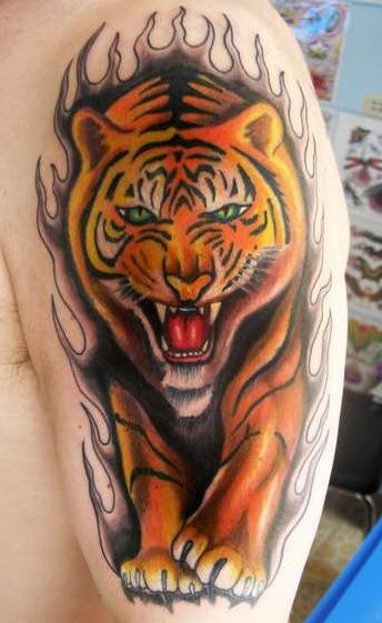 Tiger in black flame coloured tattoo