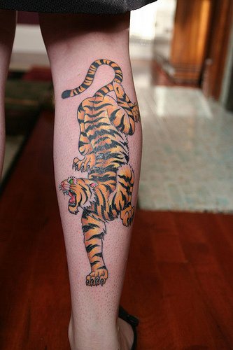 Asian crawling tiger tattoo