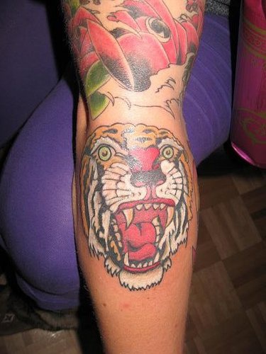 Asian style roaring tiger head tattoo