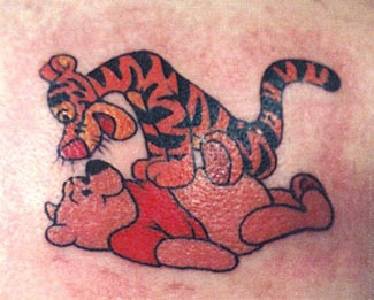 Tigre avec le tatouage de Winnie l&quotourson