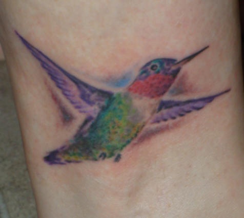Tiny hummingbird flight tattoo