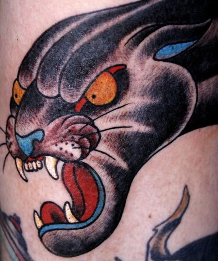 Traditional roaring black panther tattoo