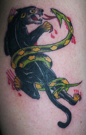Old school panther fights snake tattoo