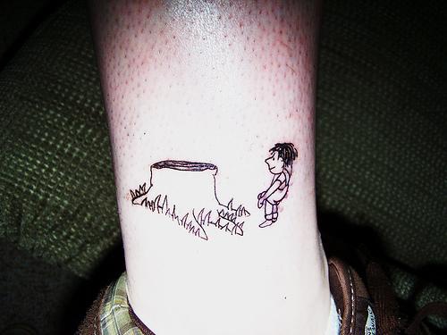Tree tattoo with stump and small man