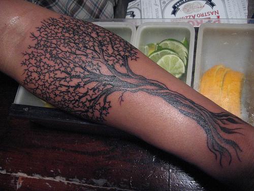 Tree tattoo with magnificent leafage
