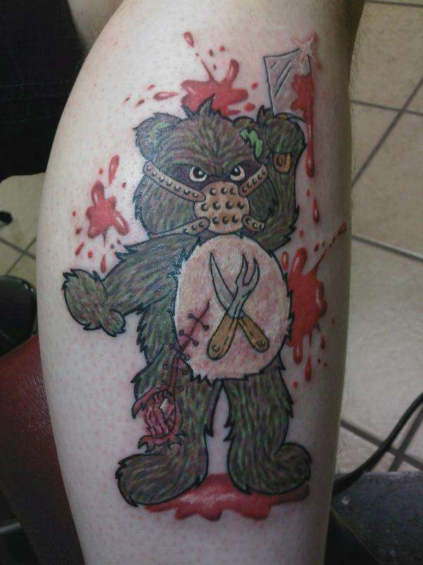 guariero ferito orsacchiotto tatuaggio