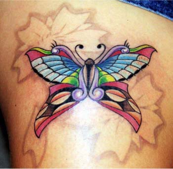mosaico di farfalla incompleta tatuaggio