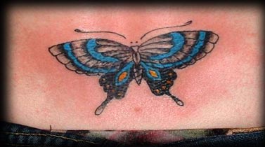 Blue monarch butterfly tattoo