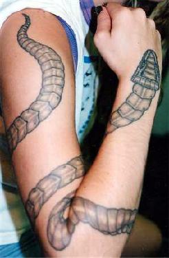 Full hand tattoo with snake
