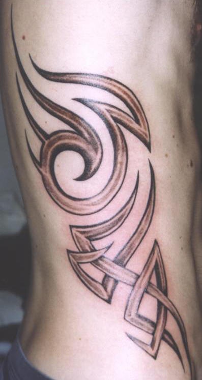 Brown tribal sign side tattoo