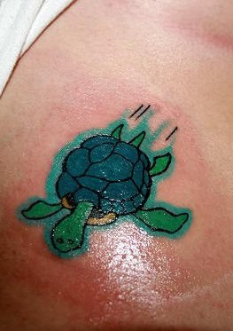 Funny small green turtle tattoo