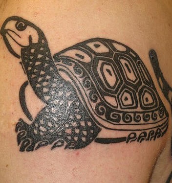 Beautiful black ink turtle tattoo