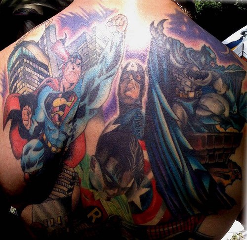 Batman flying on upper back with heroes tattoo