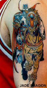 Colorful viking warrior on horse tattoo