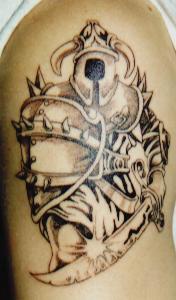 Viking warrior in armor with sword tattoo