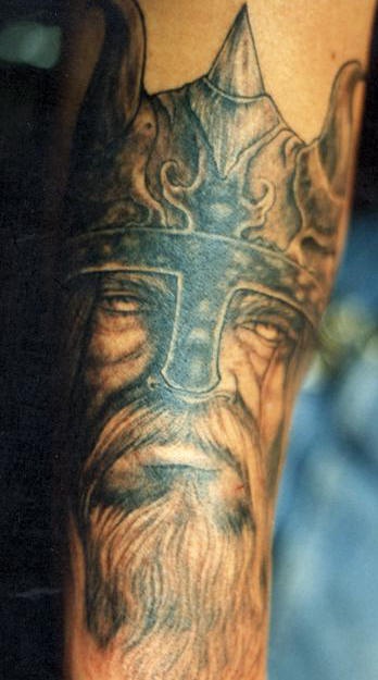 Viking in helmet with the beard portrait tattoo