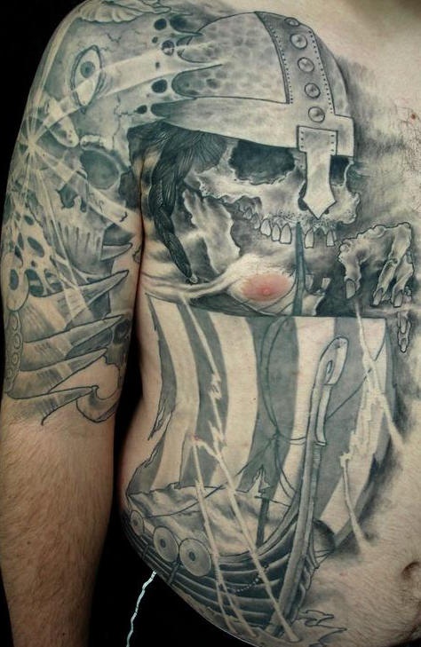 Big tattoo with viking warrior skull and ship