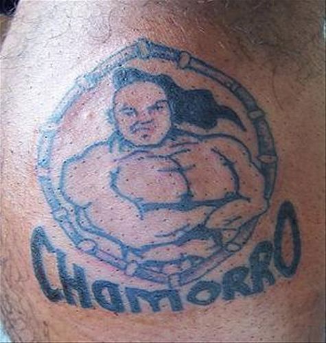 Tattoo of strong man in circle with inscription