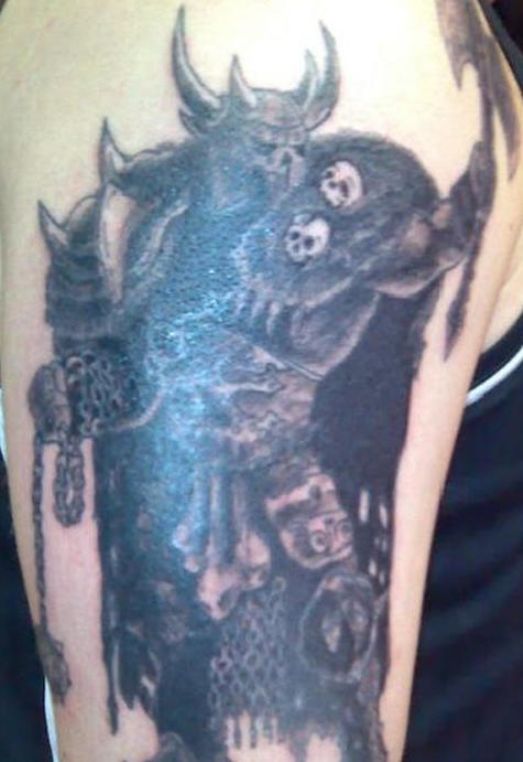 Powerful dark warrior tattoo with axe
