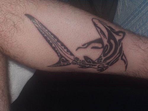 Water animal tattoo with tribal shark on leg