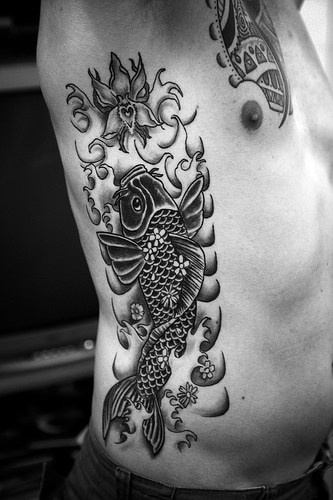 Orchid flower and koi fish  tattoo