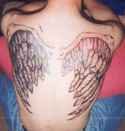 Realistic wings tattoo on back