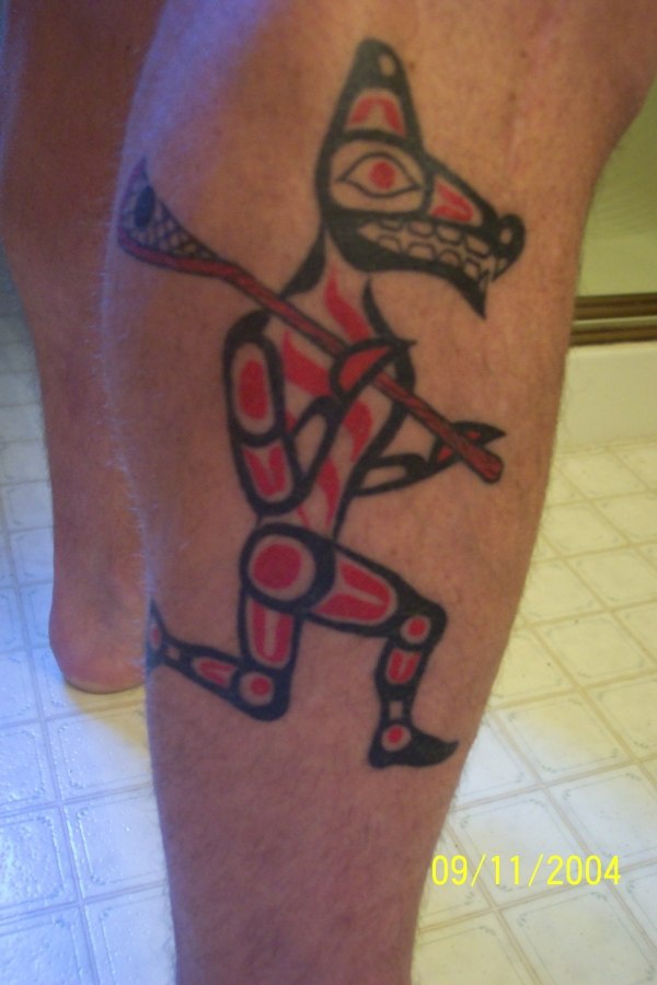 Black & red wolf tattoo in egypt style