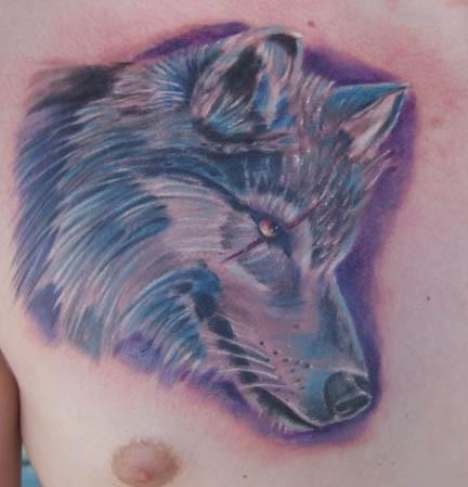 Colored tattoo with wolf head