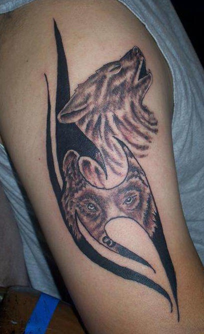 Tattoo with sad wolves howling