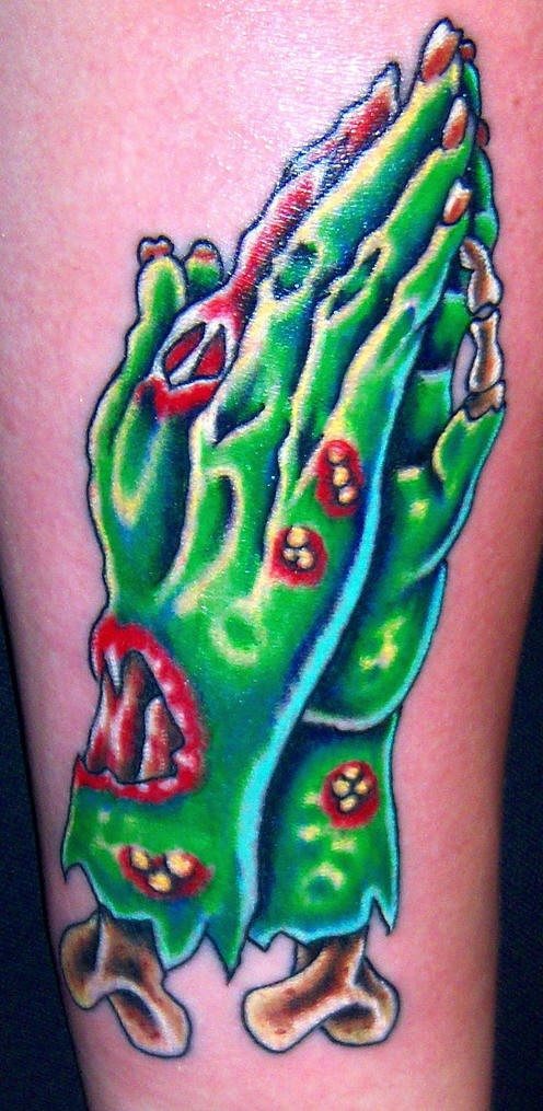 Zombie green praying hands tattoo