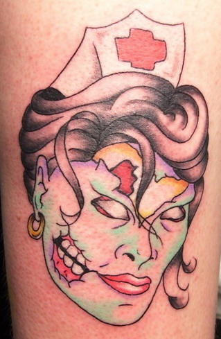 Simple zombie nurse head tattoo