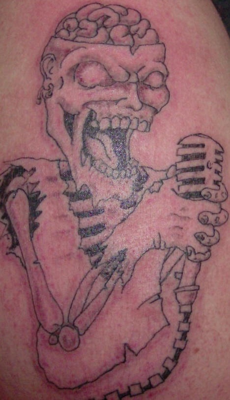 Zombie with microphone tattoo