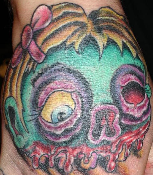 Zombie little girl head tattoo