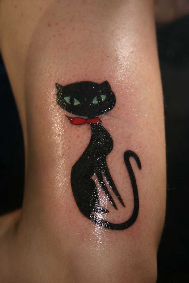 Black cat with red scarf tattoo