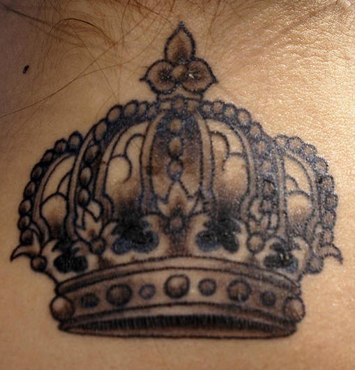 Tattoo black crown on neck