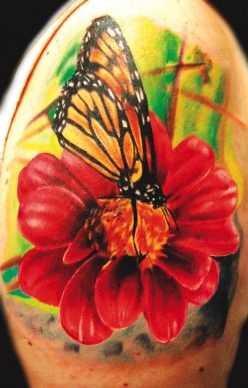 Tattoo butterfly on flower