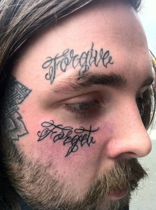 Tattoo forgive on face for men