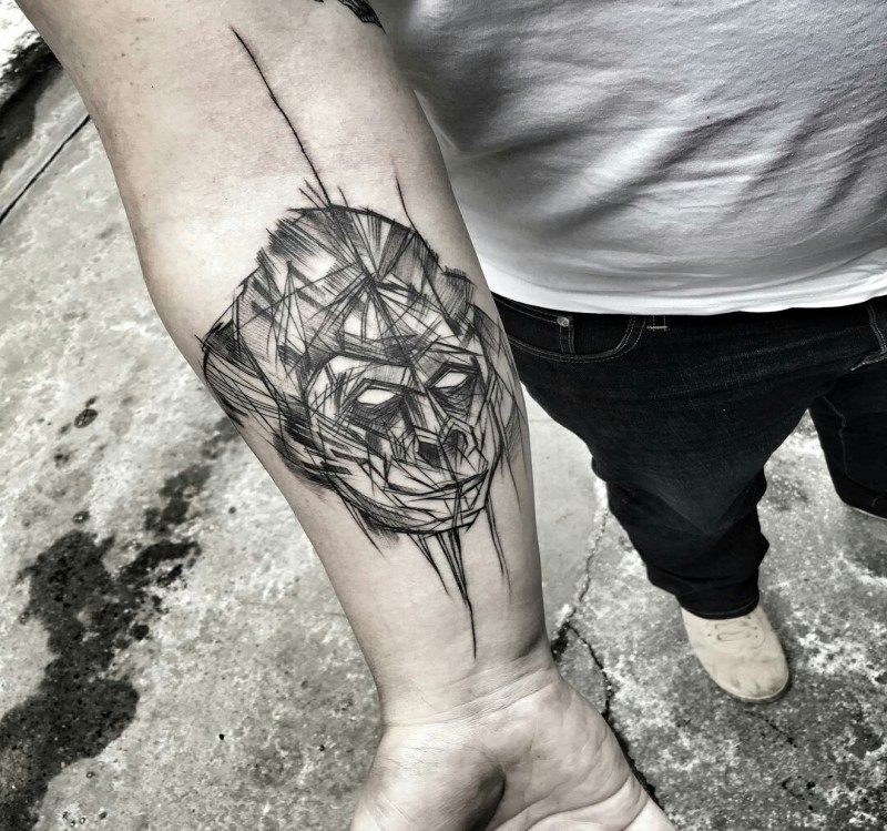 Tattoo painted by Inez Janiak blackwork style forearm tattoo of gorilla head