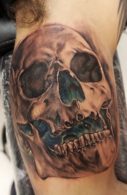 Super realistic skull tattoo