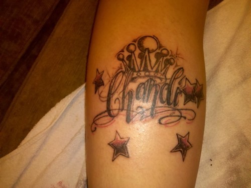 Tattoo with four stars and nice crown