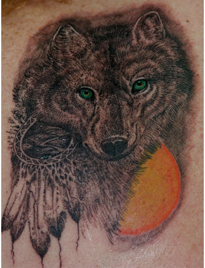 Tattoo wolf portrait sun